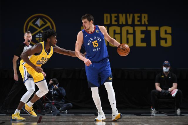 乐鱼官网-三双手到擒来 约基奇延续MVP表现率掘金继续攀登